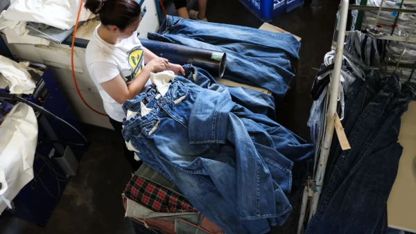 Innovative financing essential to decarbonizing fashion industry: H&M and EY | ESG Dive